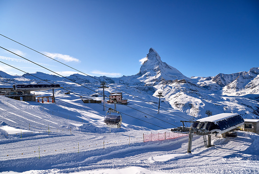 Matterhorn and cable car station at winter sunny day, Switzerland Alps.