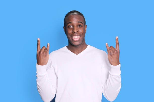 istock handsome young african american man laughing gesturing 1285493740