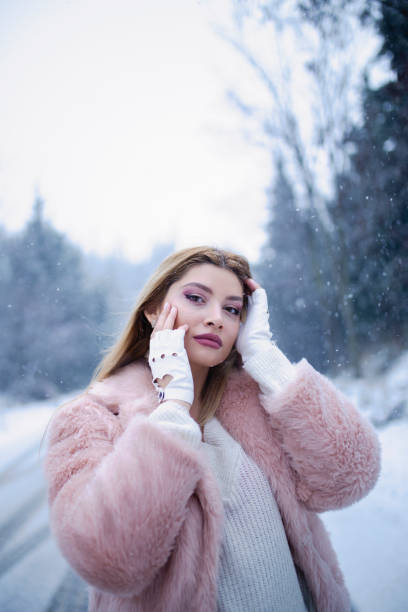 istock woman in snow 1285494494
