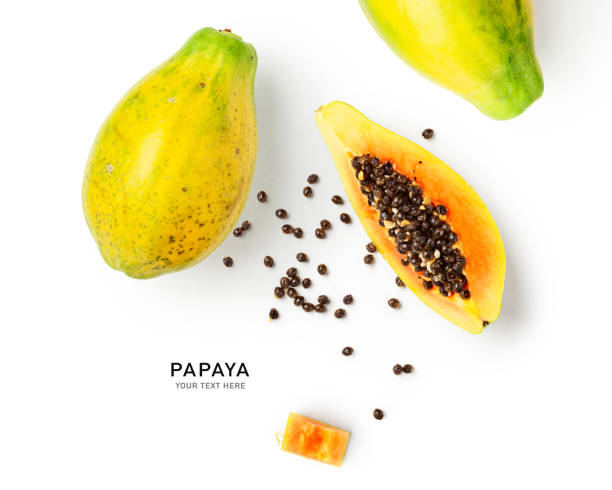 Creative layout with papaya Papaya fruit creative layout isolated on white background. Food, healthy eating and dieting concept. Tropical fruits arrangement and composition. Flat lay, top view papaya stock pictures, royalty-free photos & images
