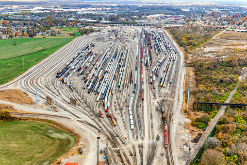 Aerial view of a large rail yard located just outside of St. Louis, Missouri on the eastern side of the Missisppi River in the state of Illinois.