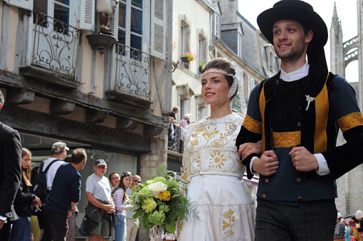Quimper, Brittany/France- July 28, 2019 : The annual Festival de Cornouaille in the city of Quimper. People in traditional costumes defile to folk music.