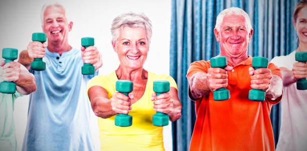 istock Portrait of seniors exercising with weights 1285500068