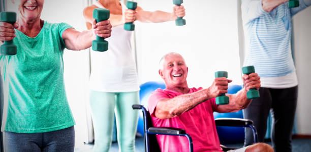 istock Portrait of seniors exercising with weights 1285500070