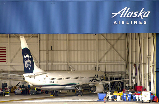 Seattle, Washington State, USA - June 2018: Alaska Airlines Boeing 737 jet (registration N432AS) in a maintenance hanger at Seattle Tacoma airport