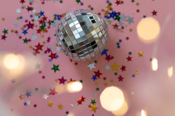 istock silver disco ball on blue background, greeting card wallpaper template with empty space for text 1285501651