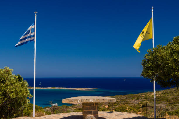 istock Altar with Greek and Byzantine flags overlooking the ocean 1285502705