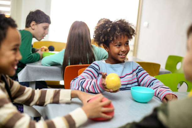 istock Children in a school cafeteria 1285507463