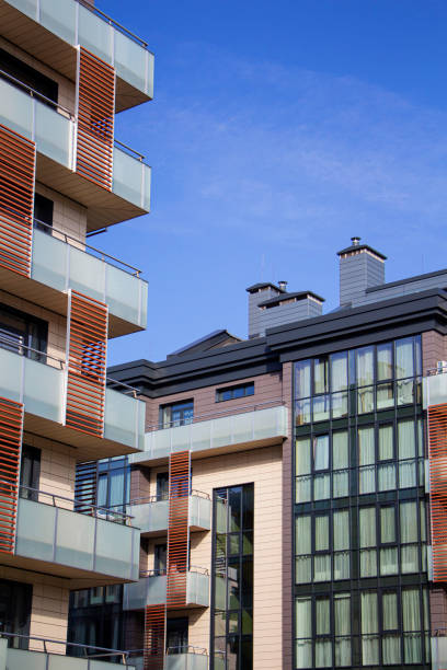 istock Modern apartment building in sunny day against blue sky. 1285507588