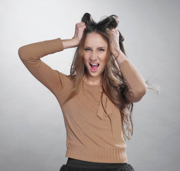istock Young girl with headache 1285508271