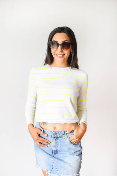 istock Pretty young woman in sunglasses. Studio shot 1285508483