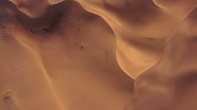 Aerial top view on sand dunes in desert
