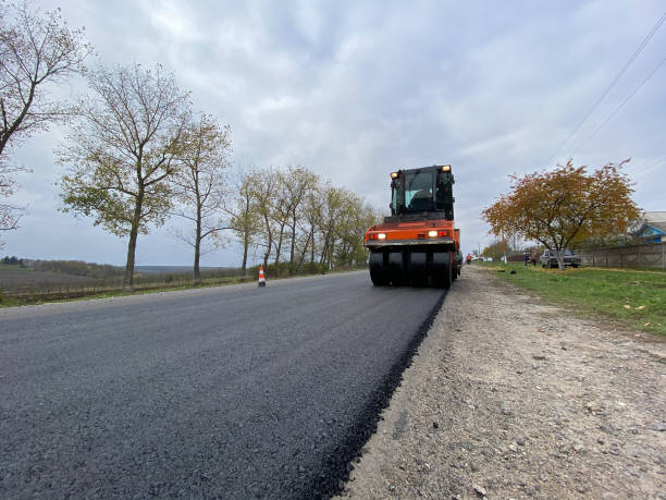 istock Road repairs, warning signs. Track laying concept 1285511055