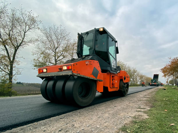 istock Road repairs, warning signs. Track laying concept 1285511079