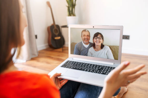 istock Video call. Woman talks online with her parents 1285511732
