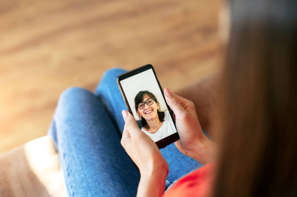 istock Video call. Woman talks online with her mother 1285511754