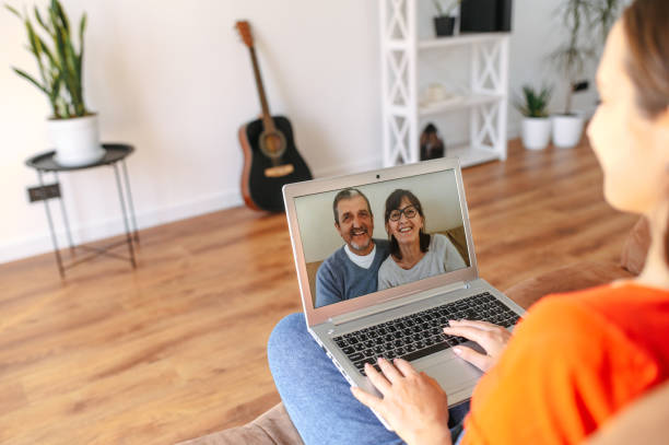istock Video call. Woman talks online with her parents 1285511801