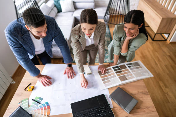 istock High angle view of young people working on new design ideas 1285512940