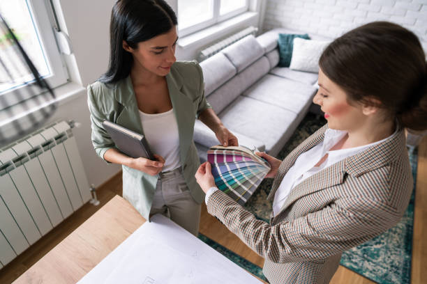istock High angle view of a female designer holding a color palette while her client making a choice 1285513009
