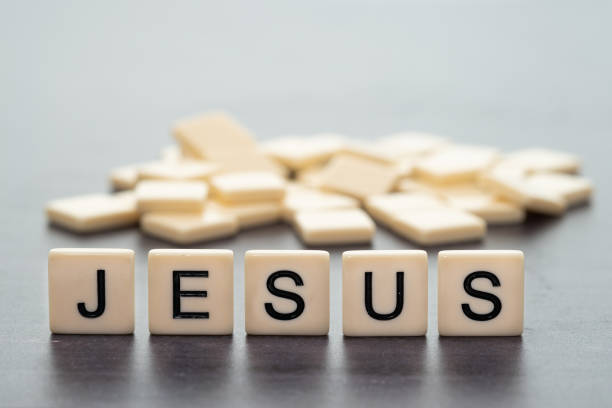 The word JESUS spelt out from game letters.\n***Inspector Note :- Please note that these plastic letters are not from a Scrabble board game, they are simply similar ***