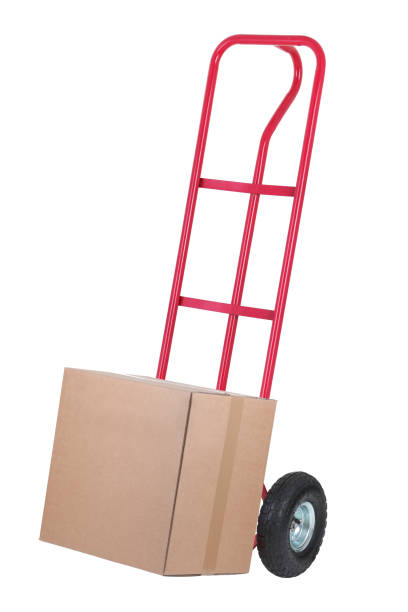 Trolley sack barrow with parcel for delivery A trolley sack barrow with parcel for delivery nigel pack stock pictures, royalty-free photos & images