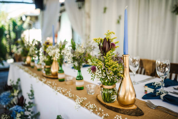 istock Table decoration for a special occasion -  boho wedding table set up. Outdoor wedding/party 1285514761