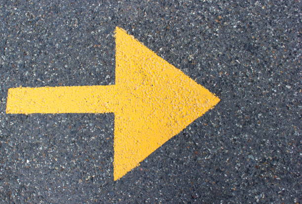 istock Yellow arrow to the right 1285516192