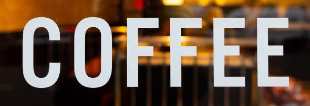 istock Coffee sign in a restaurant window 1285519238