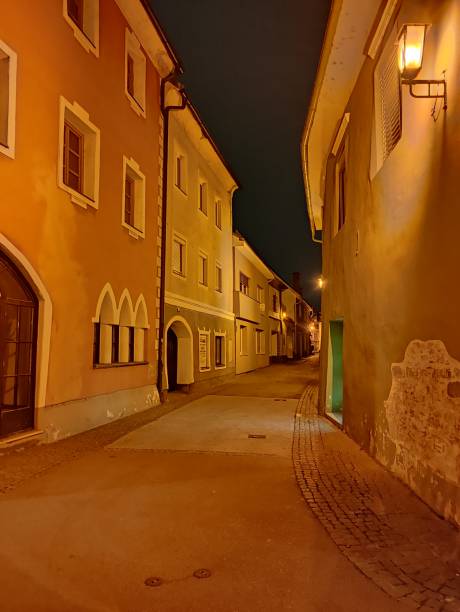 istock Little alley at night 1285520185
