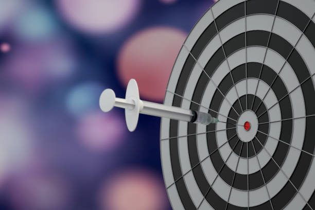 istock Vaccine, Syringe on Dartboard, Covid-19, Coronavirus Concept 1285520486