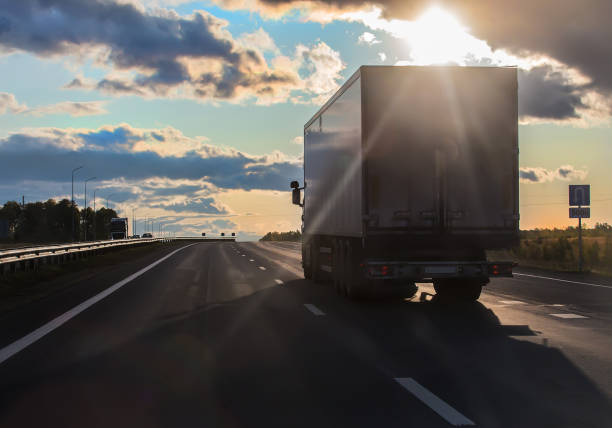 istock truck transports freight on highway 1285521485