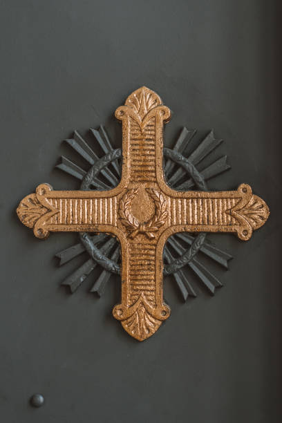 istock iron cross near the church 1285527563