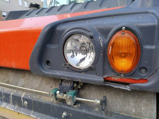 istock Lights from a truck or roller. Lanterns with orange and transparent white glass. Mechanization for construction and road works. A close-up of a road roller. 1285531002