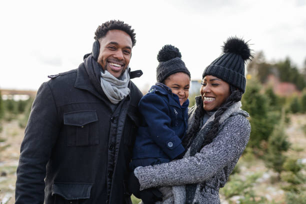 istock A family portrait at a Christmas tree farm 1285532944