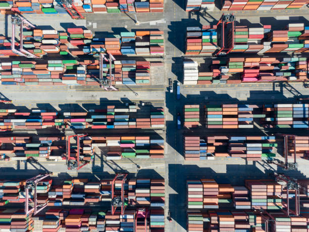 istock industrial port with containers. 1285533313