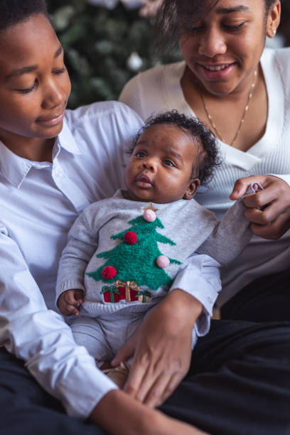 istock Enjoying baby's first Christmas as a family 1285534243