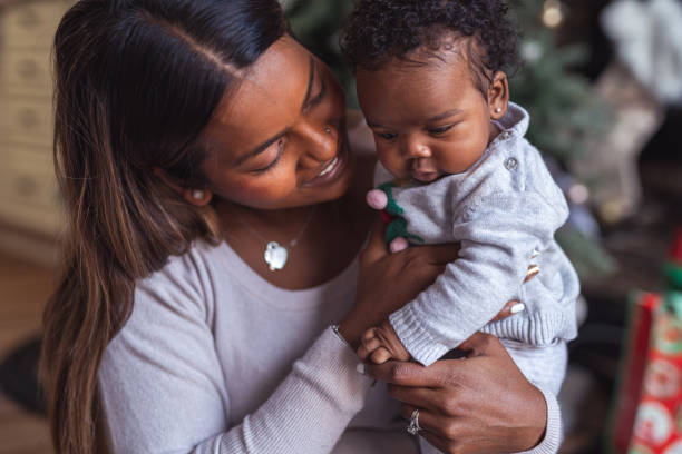 istock Family hugs on Christmas Day 1285534254