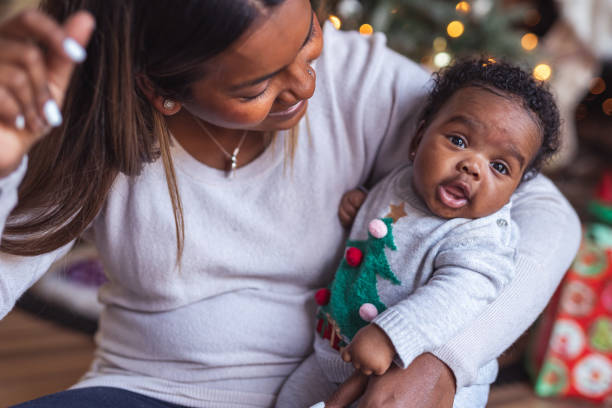 istock Newborn cuddles on Christmas Day 1285534255
