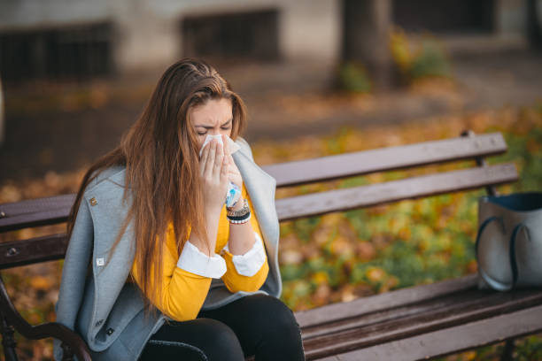 istock Sick young woman with cold and flu 1285536093