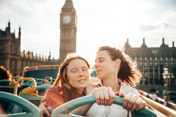 istock lesbian couple on the bus in london 1285537149