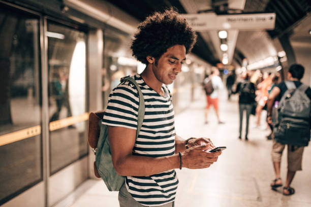 istock man at the station waiting the train 1285537226
