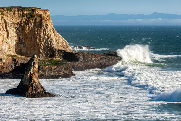 istock Ocean Waves Crashing on Rocky California Coast Beach 1285539107