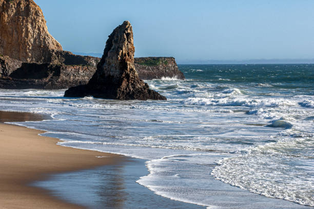 istock Ocean Waves Crashing on Rocky California Coast Beach 1285539131