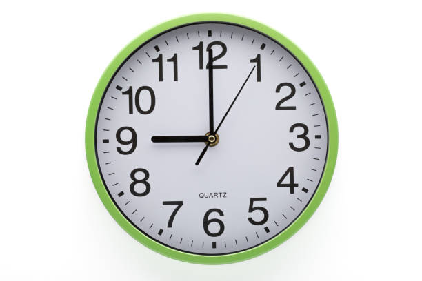 istock Nine o'clock. Clock on white background showing time. Clipping path included. 1285545566