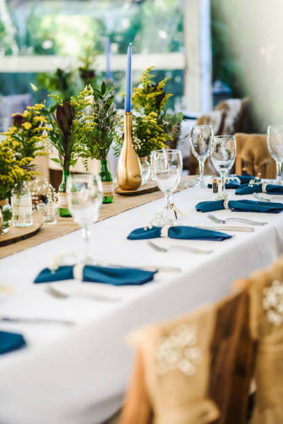 istock Table decoration for a special occasion -  boho wedding table set up. Outdoor wedding/party 1285548858