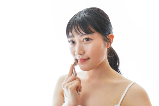 istock Young woman massaging a skin 1285565630