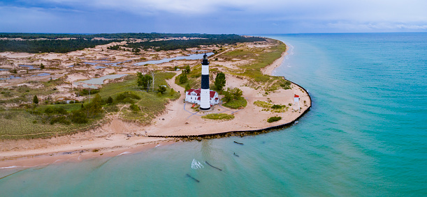 Photo by: Brian Sevald - brian@briansevald.comAn aerial view of the lighthouse beaches and dunes at Ludington State Park in Ludington, MI