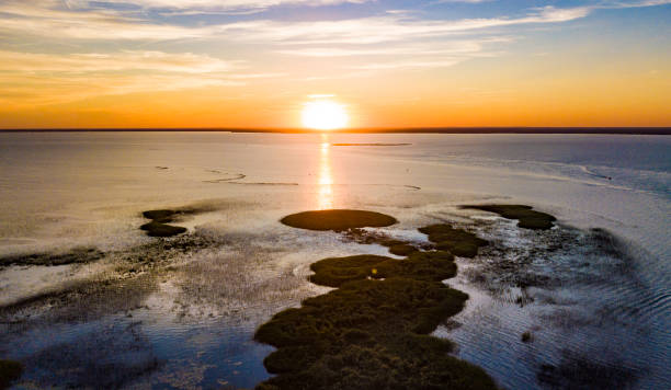 An aerial view of the sun setting on Lake Saint Clair, Michigan stock photo