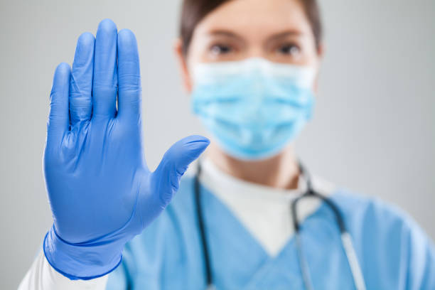istock Doctor hand gesturing halt or stop 1285567380
