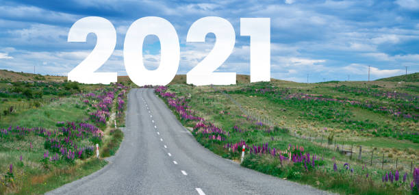 istock 2021 New Year road trip travel and future vision concept . 1285568771